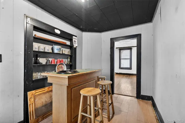 a kitchen with stainless steel appliances granite countertop a stove and a refrigerator
