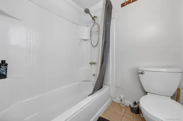 a bathroom with a sink and a window