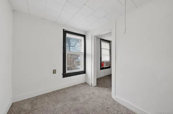 a living room with furniture and window
