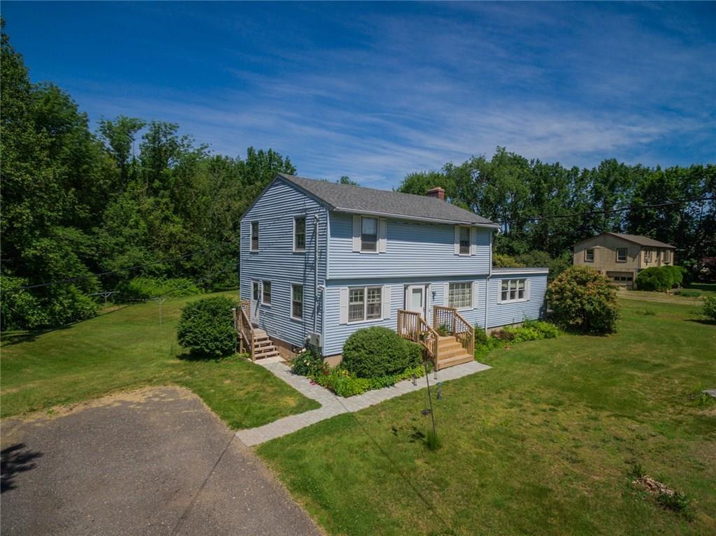 640 Westchester Road Colchester, CT 06415 - Photo 1 of 1 a house view with a garden space