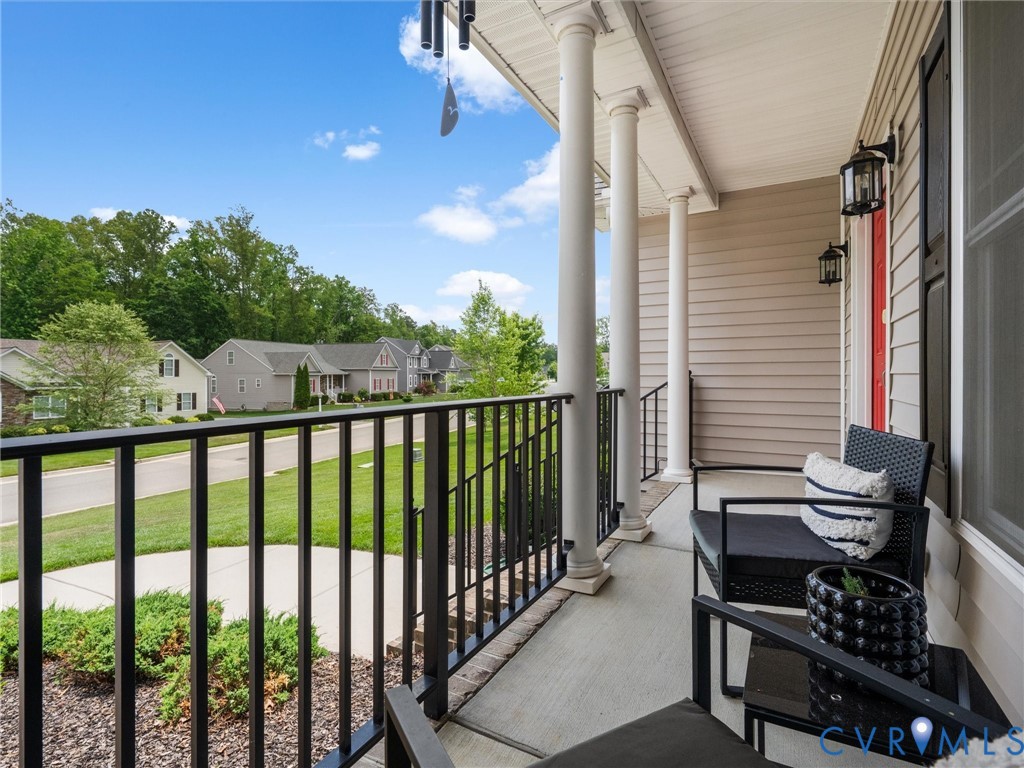 10824 Avening Road Chesterfield, VA 23832 - Photo 5 of 47 a view of a balcony with chairs