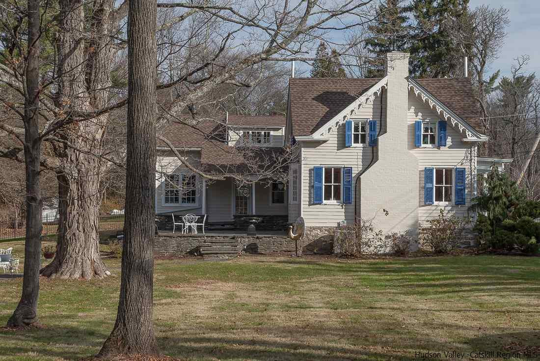 3 Mill Dam Road Stone Ridge, NY 12484 - Photo 4 of 33 a front view of a house with a yard