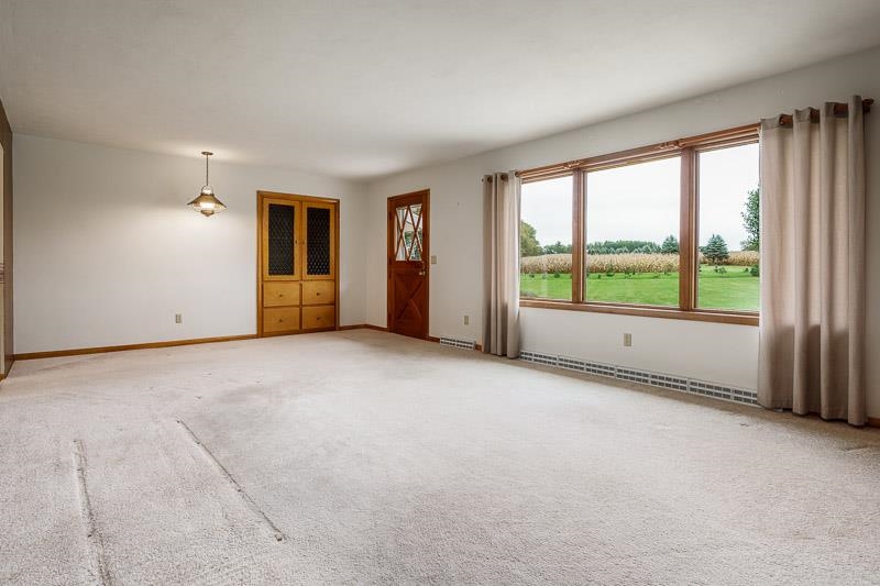 2369 South Lowden Road Oregon, IL 61061 - Photo 17 of 51 a view of an empty room with a window