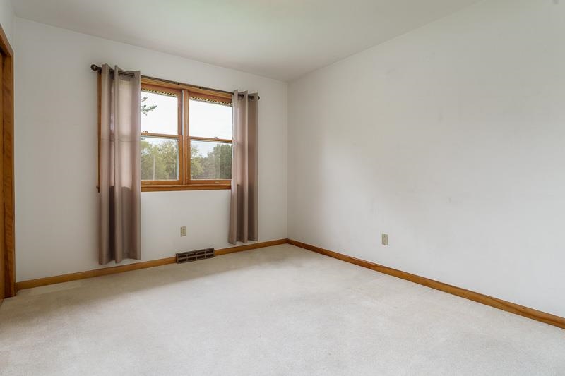2369 South Lowden Road Oregon, IL 61061 - Photo 29 of 51 an empty room with a window