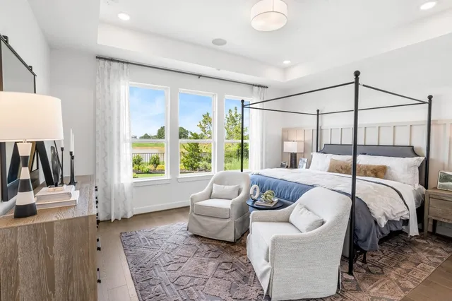 a bed room with a bed and a couch