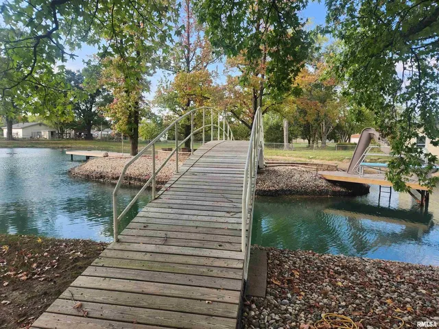 a view of a lake with trees