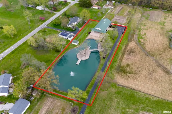 a view of swimming pool with a yard
