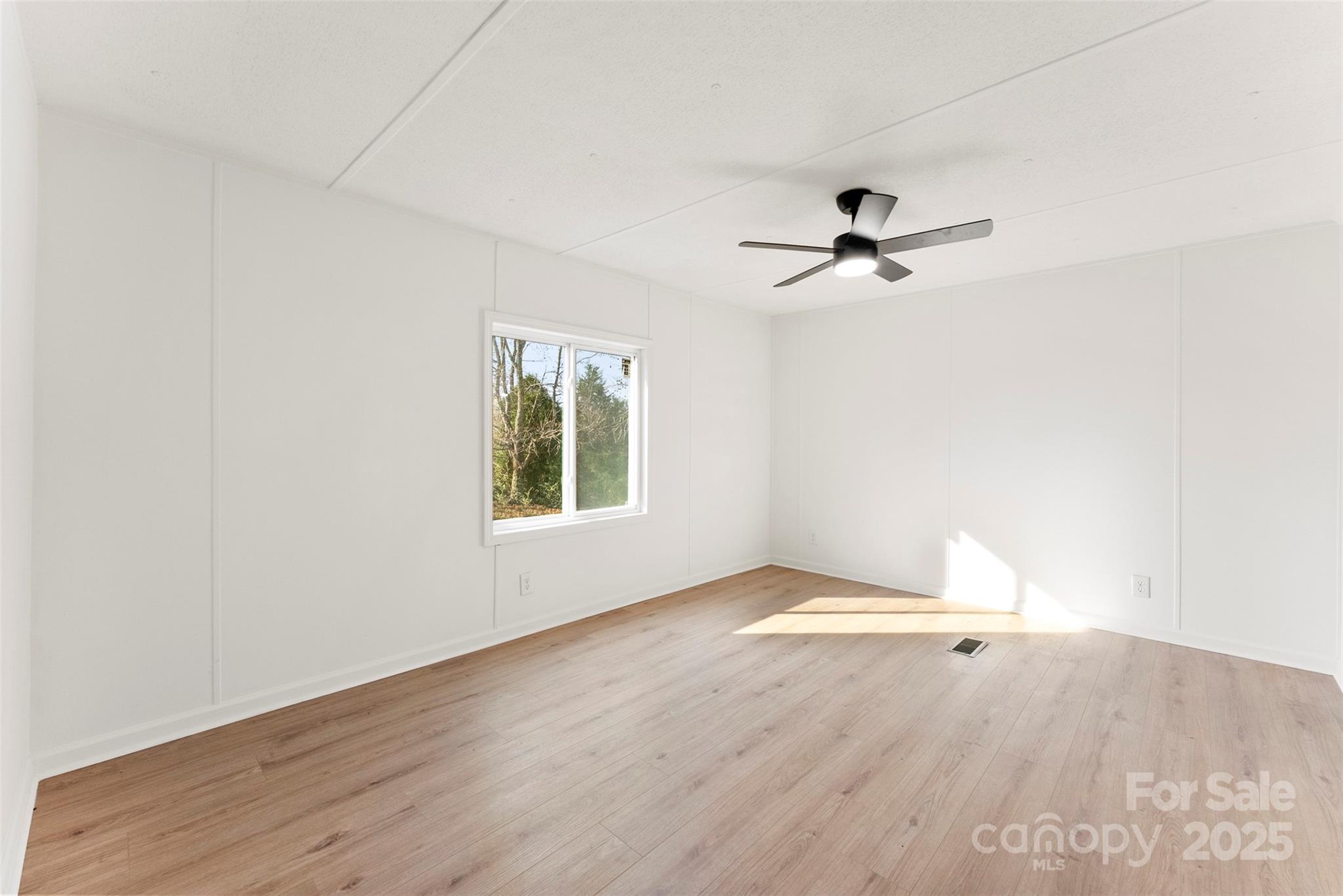 226 Muldoon Lane Clover, SC 29710 - Photo 14 of 31 an empty room with fan and windows