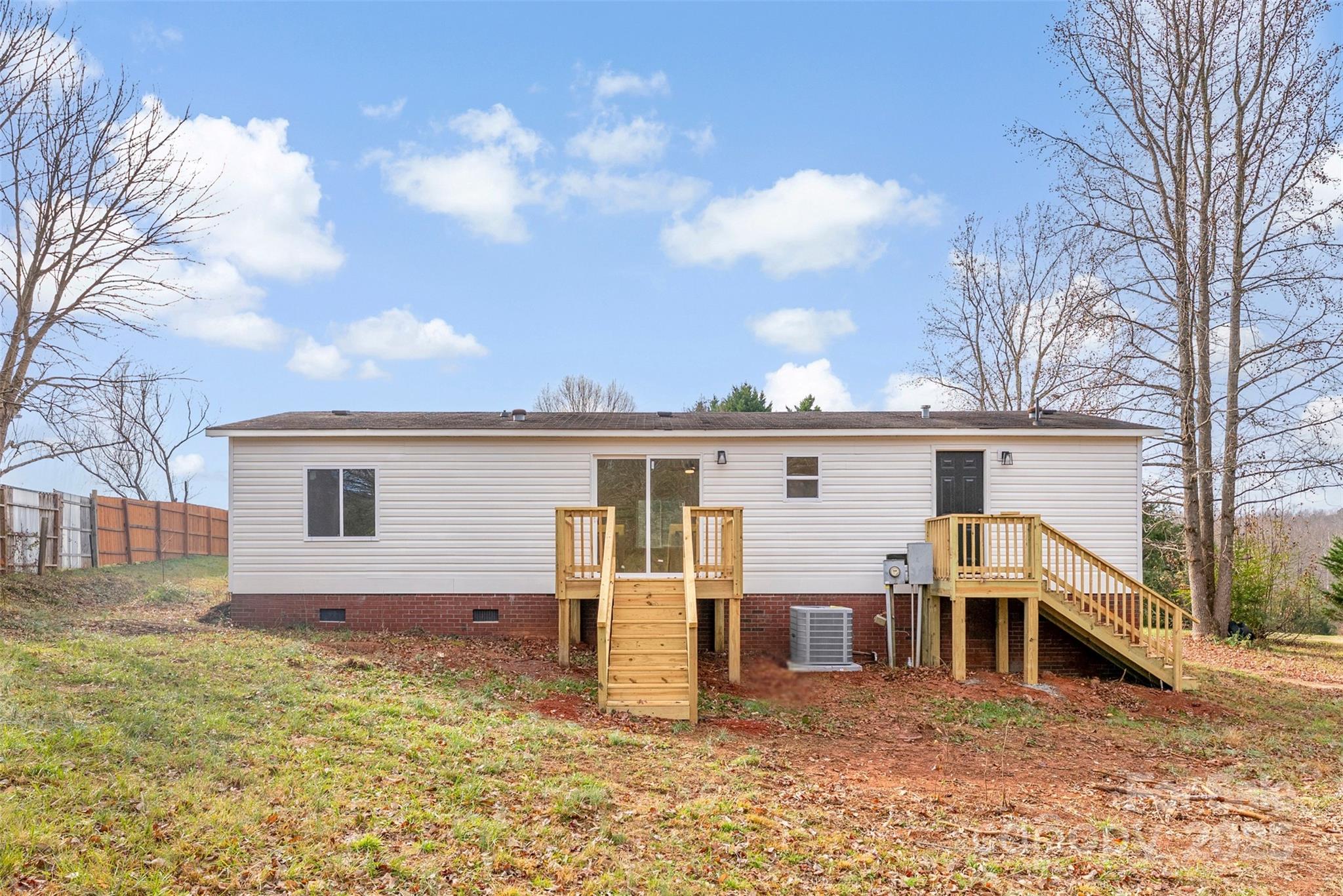 226 Muldoon Lane Clover, SC 29710 - Photo 25 of 31 a view of a house with a yard