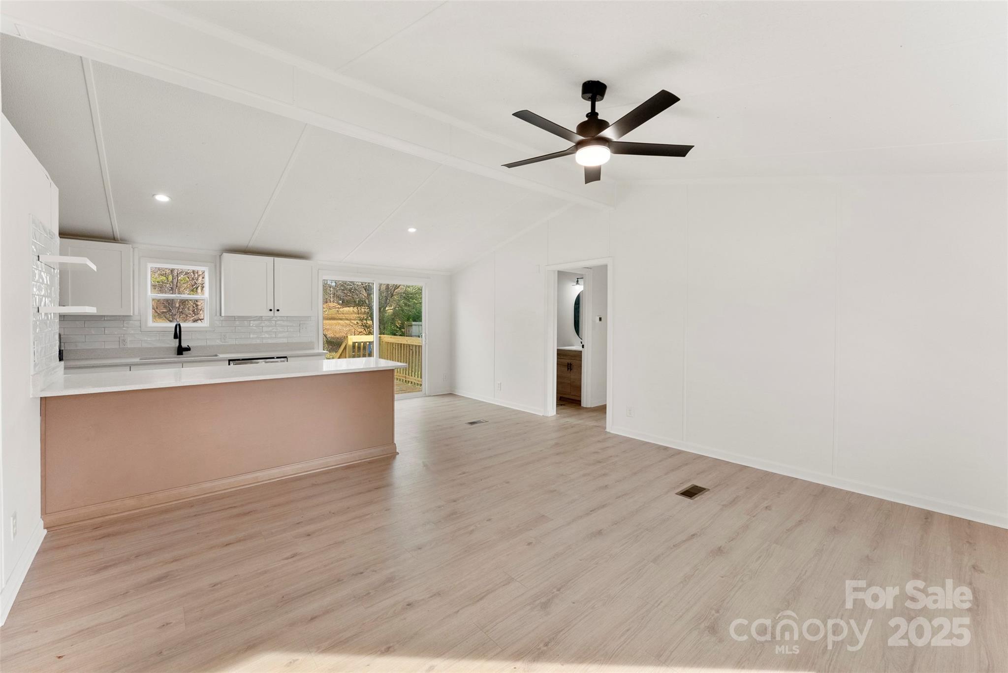 226 Muldoon Lane Clover, SC 29710 - Photo 5 of 31 a view of kitchen with wooden floor