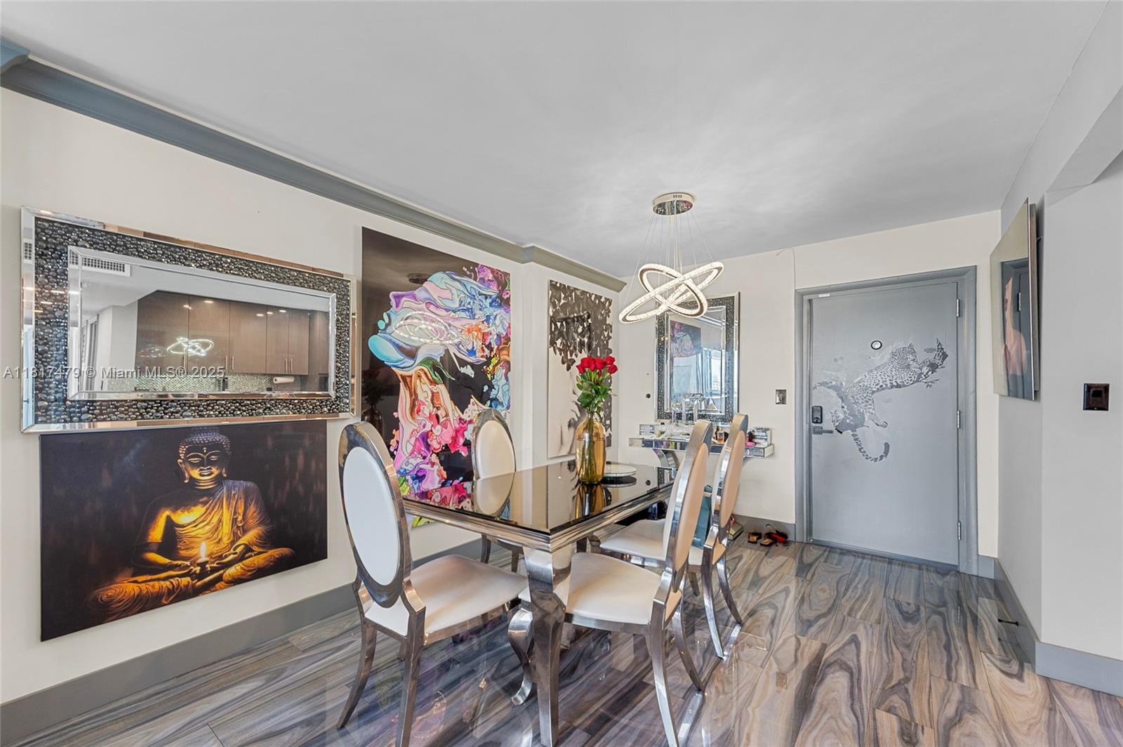 1345 Lincoln Road, Unit 1105 Miami Beach, FL 33139 - Photo 4 of 25 a view of a livingroom with furniture and painting on the wall
