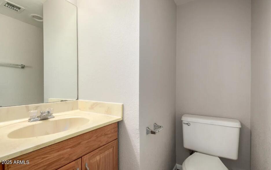 2040 South Longmore, Unit 66 Mesa, AZ 85202 - Photo 12 of 25 a bathroom with a sink and a toilet