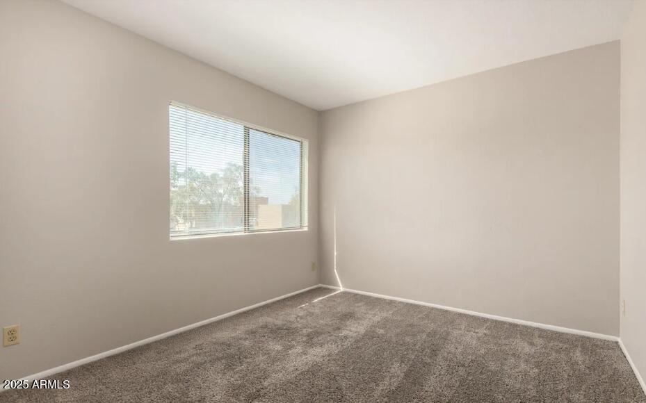 2040 South Longmore, Unit 66 Mesa, AZ 85202 - Photo 17 of 25 an empty room with a window