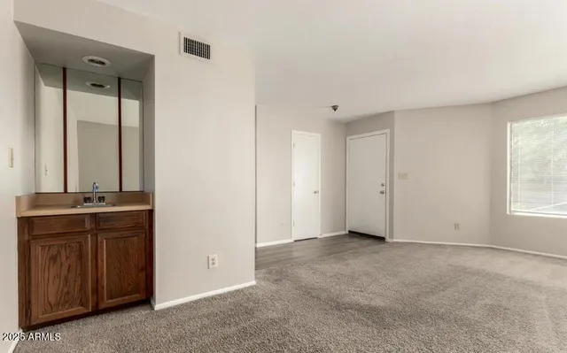 an empty room with window