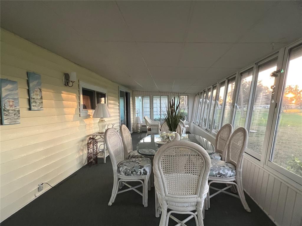 1100 South Belcher Road, Unit 469 Largo, FL 33771 - Photo 24 of 69 a dining room with furniture and window