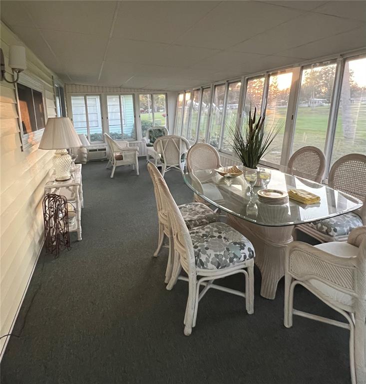1100 South Belcher Road, Unit 469 Largo, FL 33771 - Photo 25 of 69 a view of a dining room with furniture window and outside view