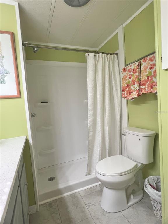 1100 South Belcher Road, Unit 469 Largo, FL 33771 - Photo 29 of 69 a bathroom with a toilet and a shower