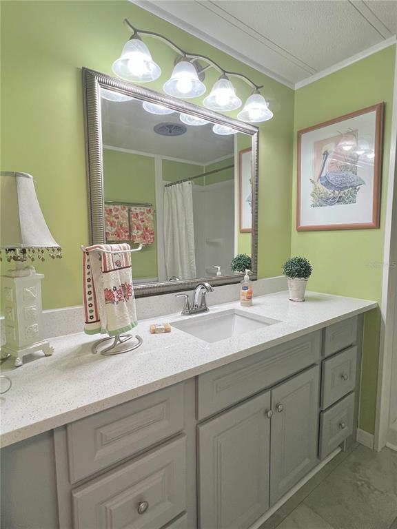 1100 South Belcher Road, Unit 469 Largo, FL 33771 - Photo 30 of 69 a bathroom with a double vanity sink and a mirror