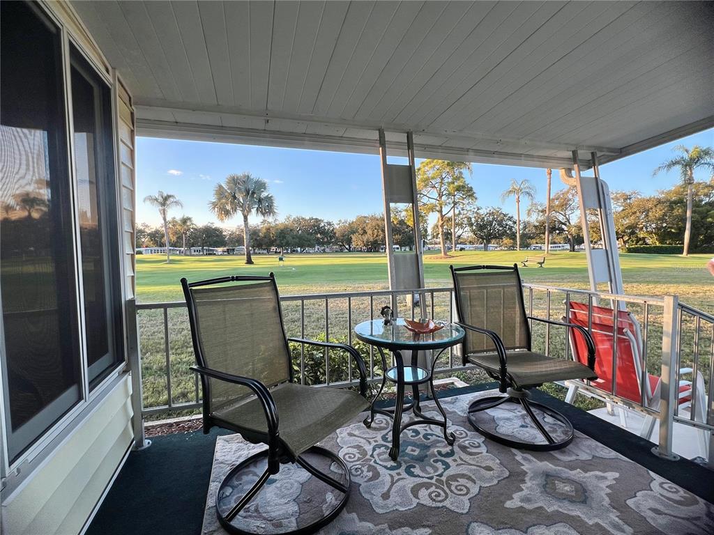 1100 South Belcher Road, Unit 469 Largo, FL 33771 - Photo 4 of 69 a view of a dining room with furniture window and outside view
