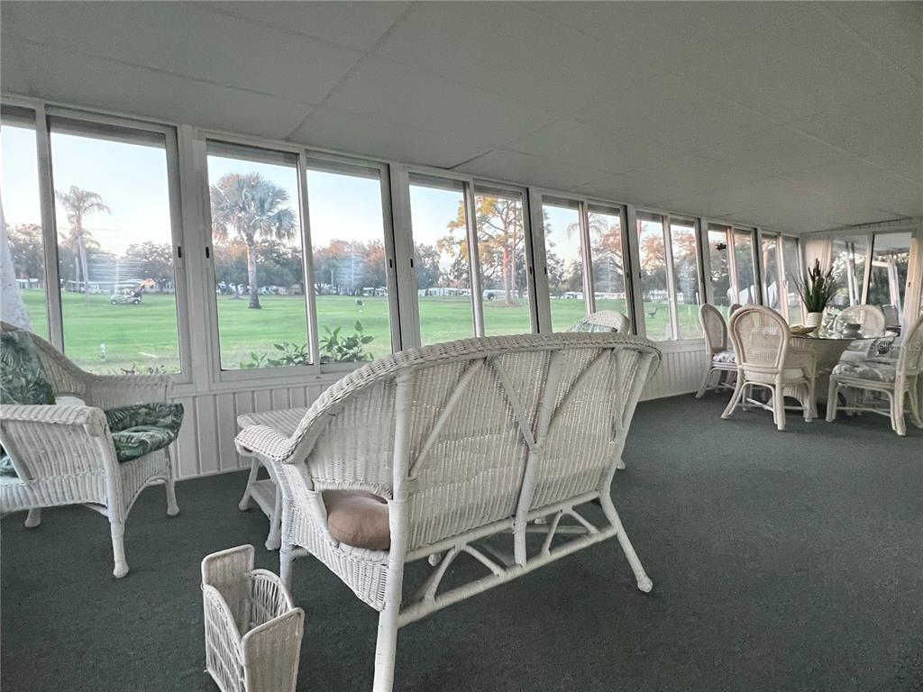 1100 South Belcher Road, Unit 469 Largo, FL 33771 - Photo 41 of 69 a bed sitting in a room next to a large window