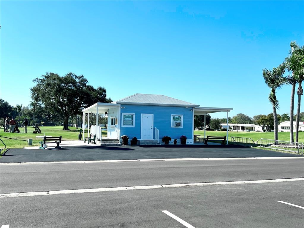 1100 South Belcher Road, Unit 469 Largo, FL 33771 - Photo 64 of 69 a car parked in front of a house