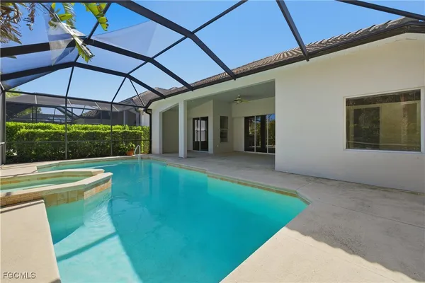 a view of a house with a yard patio and a patio