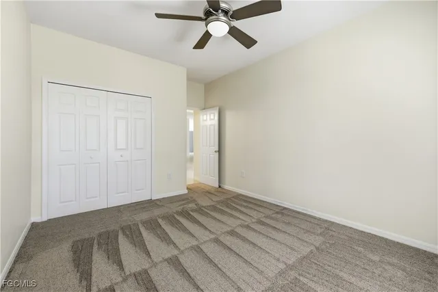 a bathroom with a bathtub shower sink vanity and toilet