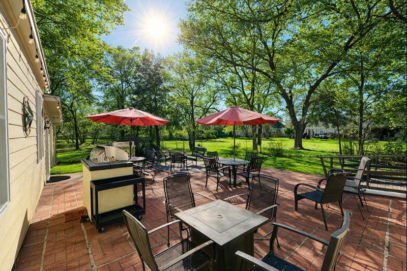 1505 Bonham Street Commerce, TX 75428 - Photo 30 of 39 outdoor cooking area. Includes a detached grill and sink that can remain with the home