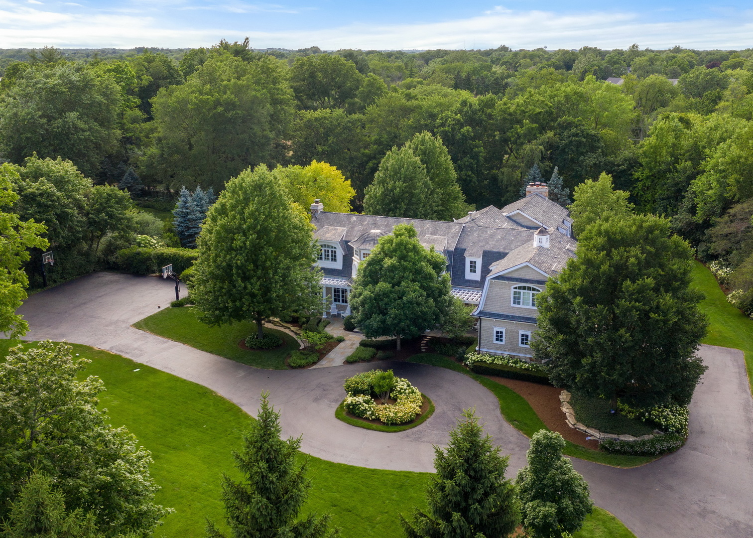 701 Plamondon Road Wheaton, IL 60189 - Photo 2 of 79 an aerial view of a house with garden