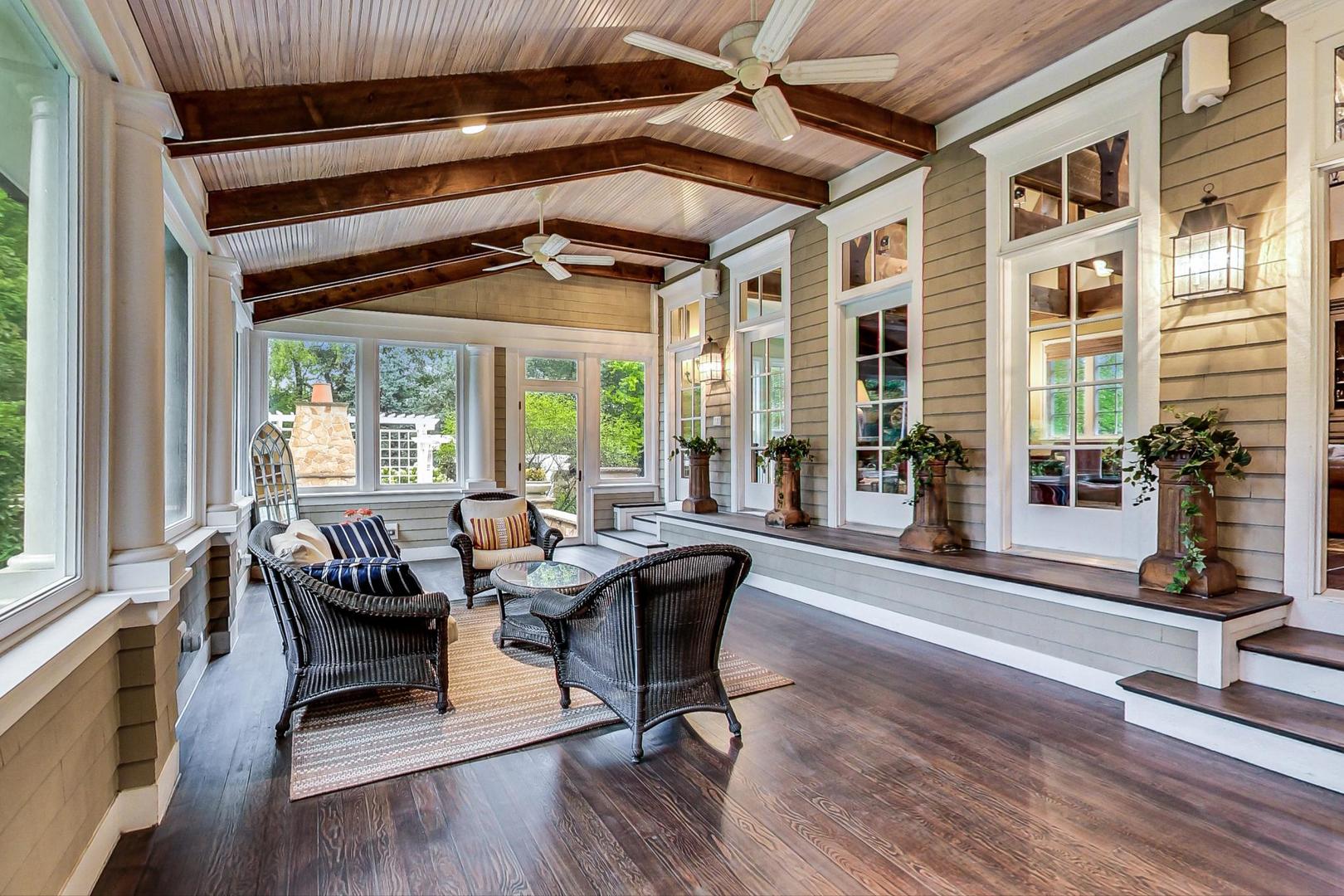 701 Plamondon Road Wheaton, IL 60189 - Photo 11 of 79 a living room with furniture and floor to ceiling windows
