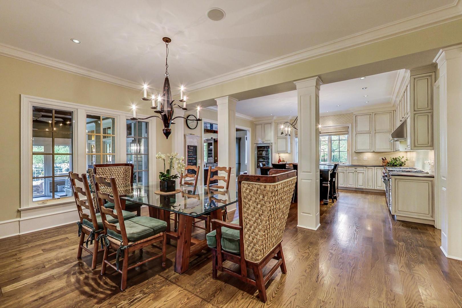701 Plamondon Road Wheaton, IL 60189 - Photo 18 of 79 a view of a dining room with furniture and wooden floor