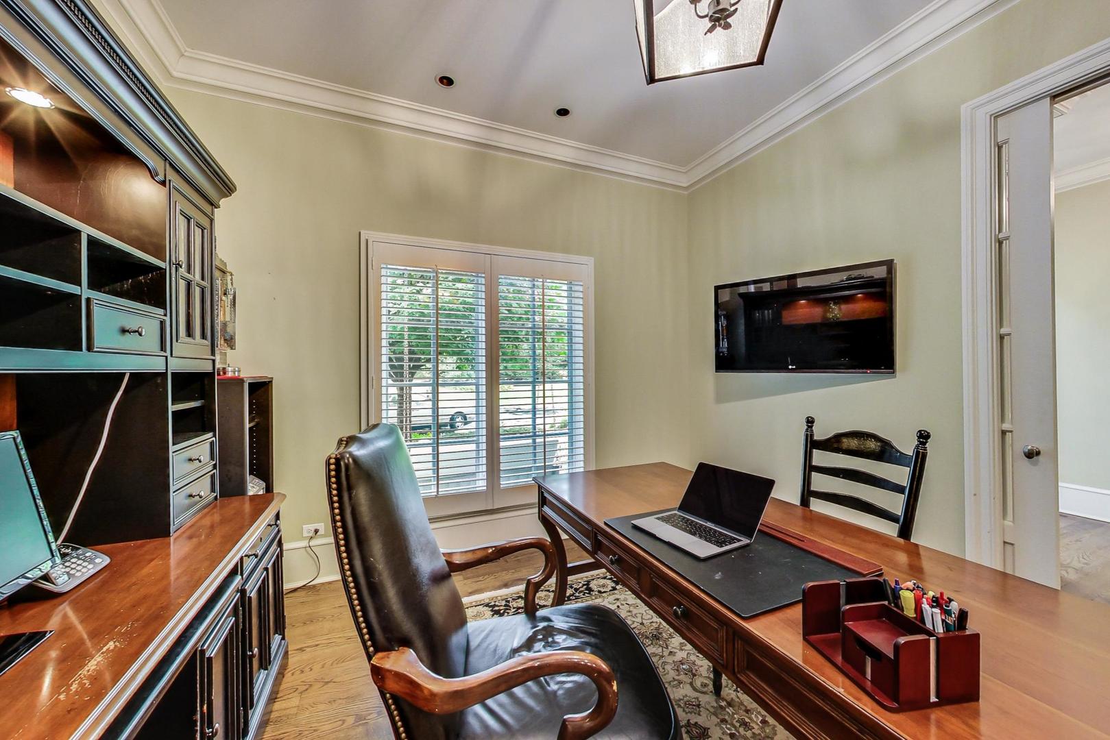 701 Plamondon Road Wheaton, IL 60189 - Photo 25 of 79 a living room with furniture and a flat screen tv