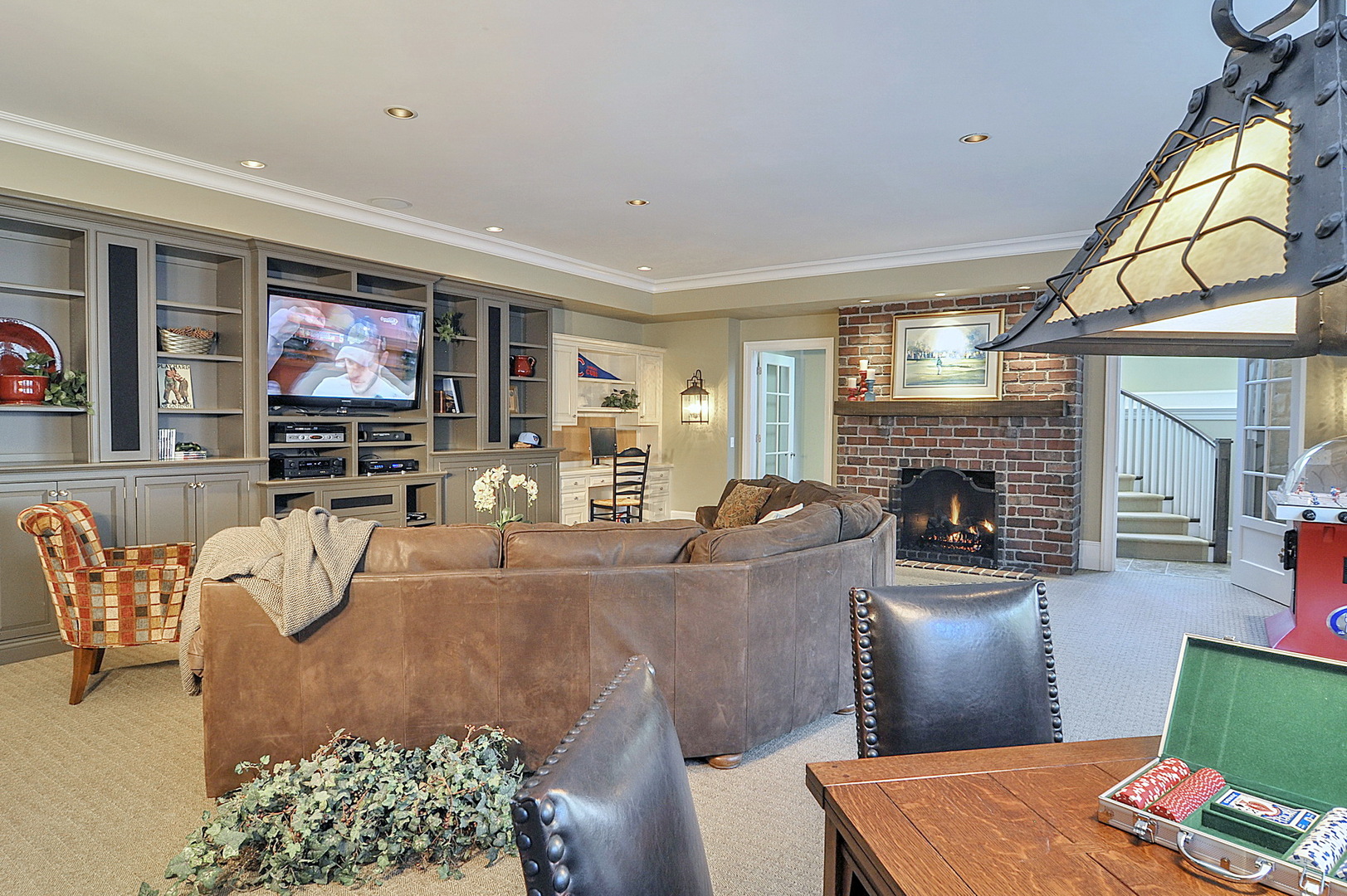 701 Plamondon Road Wheaton, IL 60189 - Photo 31 of 79 a living room with furniture and a fireplace