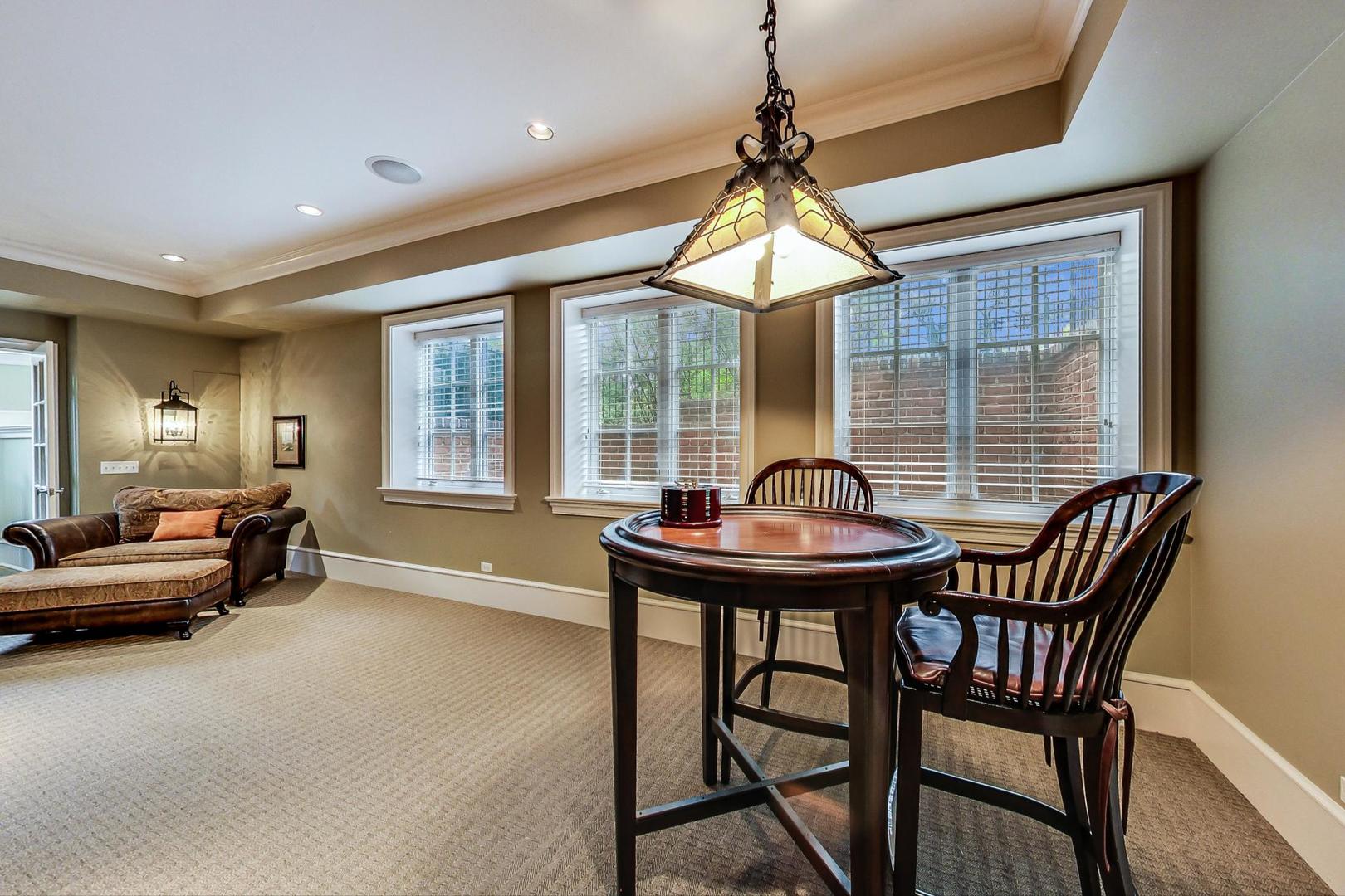 701 Plamondon Road Wheaton, IL 60189 - Photo 37 of 79 a view of a livingroom with furniture and window