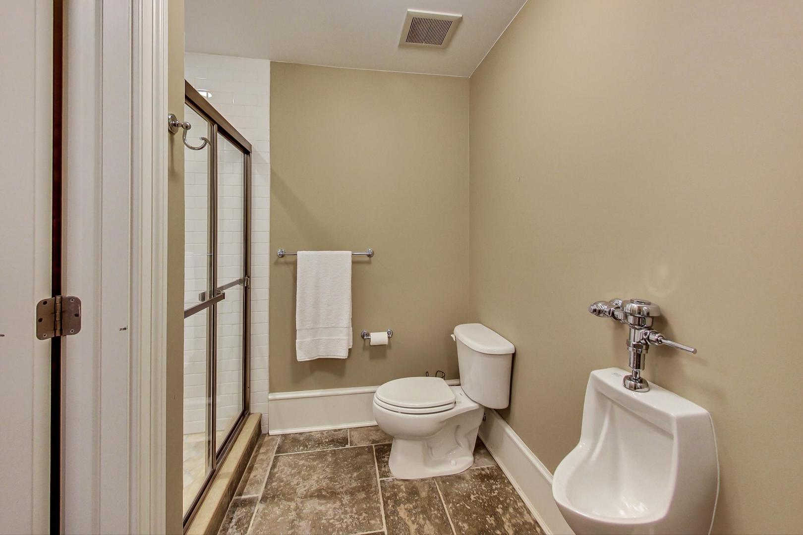701 Plamondon Road Wheaton, IL 60189 - Photo 43 of 79 a bathroom with a toilet and a shower