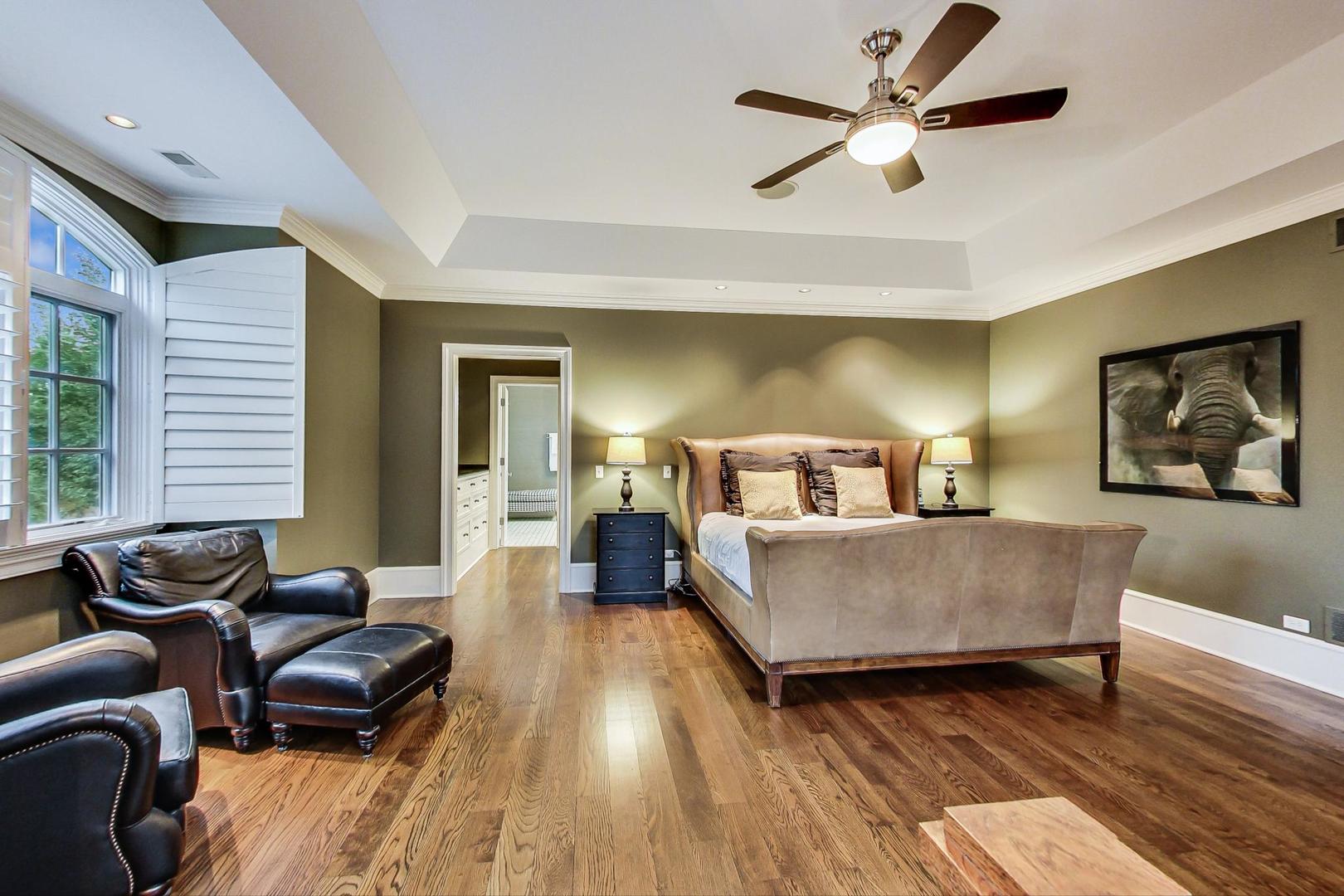 701 Plamondon Road Wheaton, IL 60189 - Photo 46 of 79 a living room with furniture and a large window