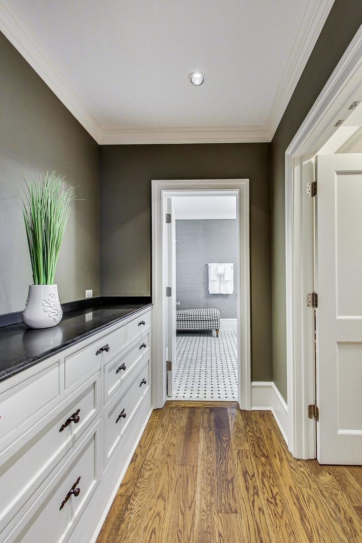 701 Plamondon Road Wheaton, IL 60189 - Photo 49 of 79 a view of a hallway to a livingroom and a couch
