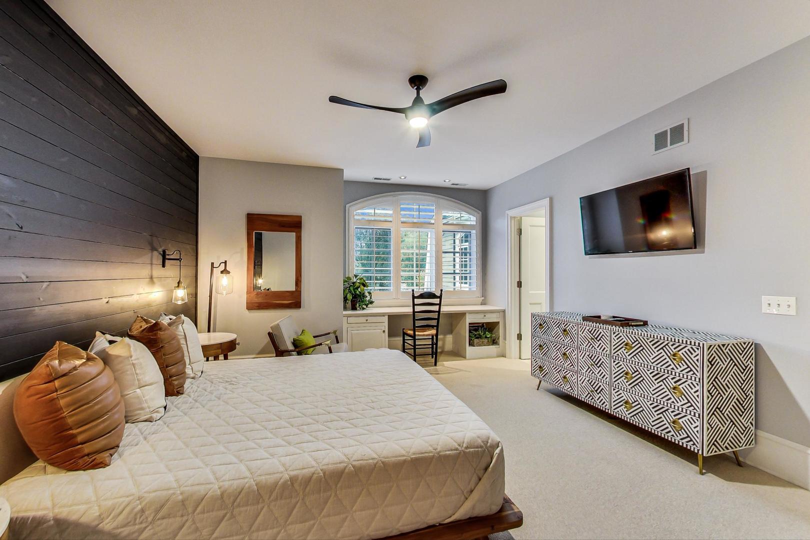 701 Plamondon Road Wheaton, IL 60189 - Photo 54 of 79 a bedroom with a bed couch and a window