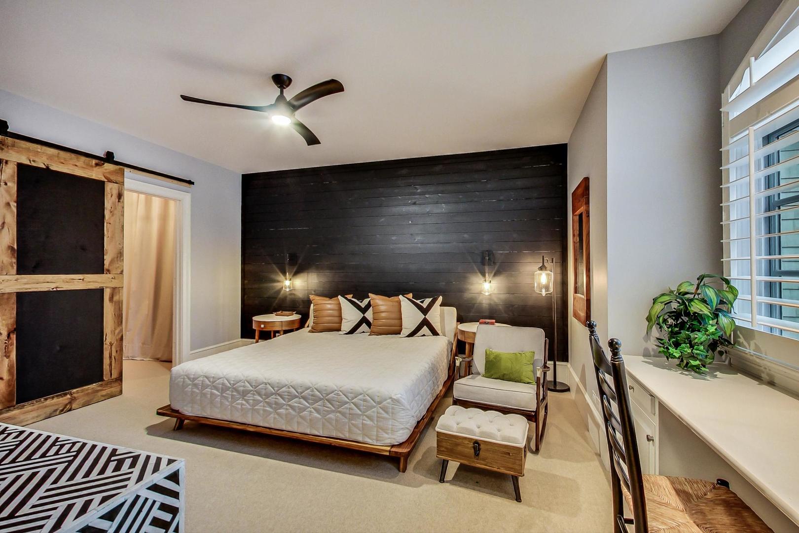 701 Plamondon Road Wheaton, IL 60189 - Photo 55 of 79 a bedroom with a bed and a chandelier