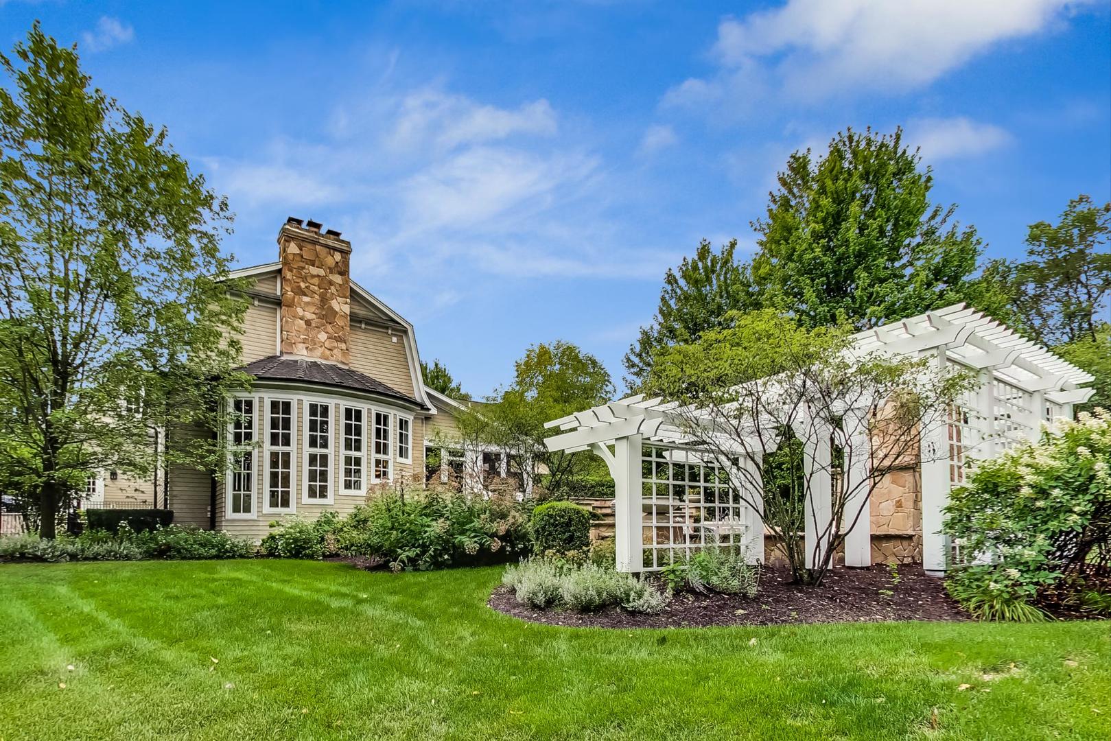 701 Plamondon Road Wheaton, IL 60189 - Photo 63 of 79 a view of a house with a yard