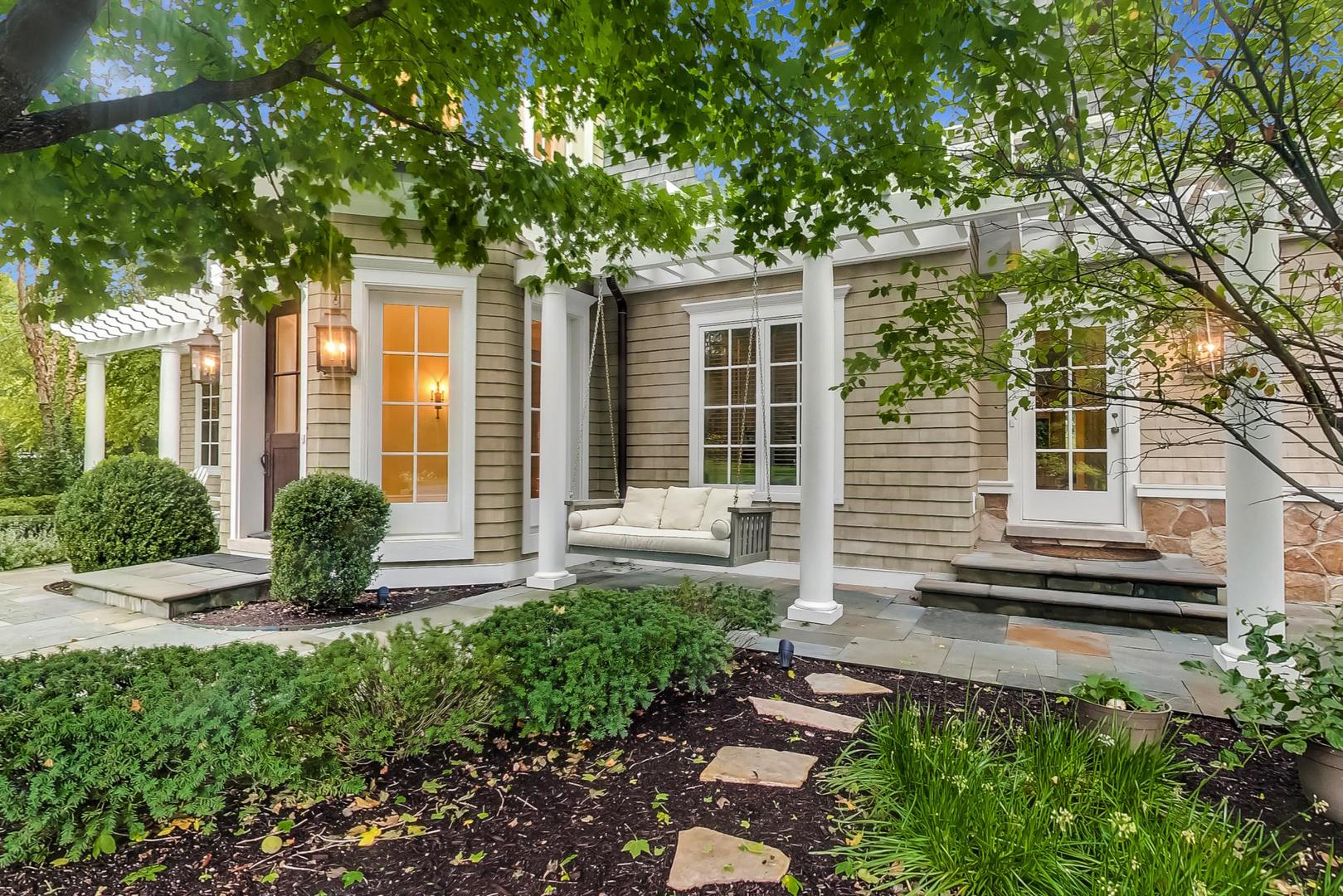 701 Plamondon Road Wheaton, IL 60189 - Photo 72 of 79 front view of a house with a garden