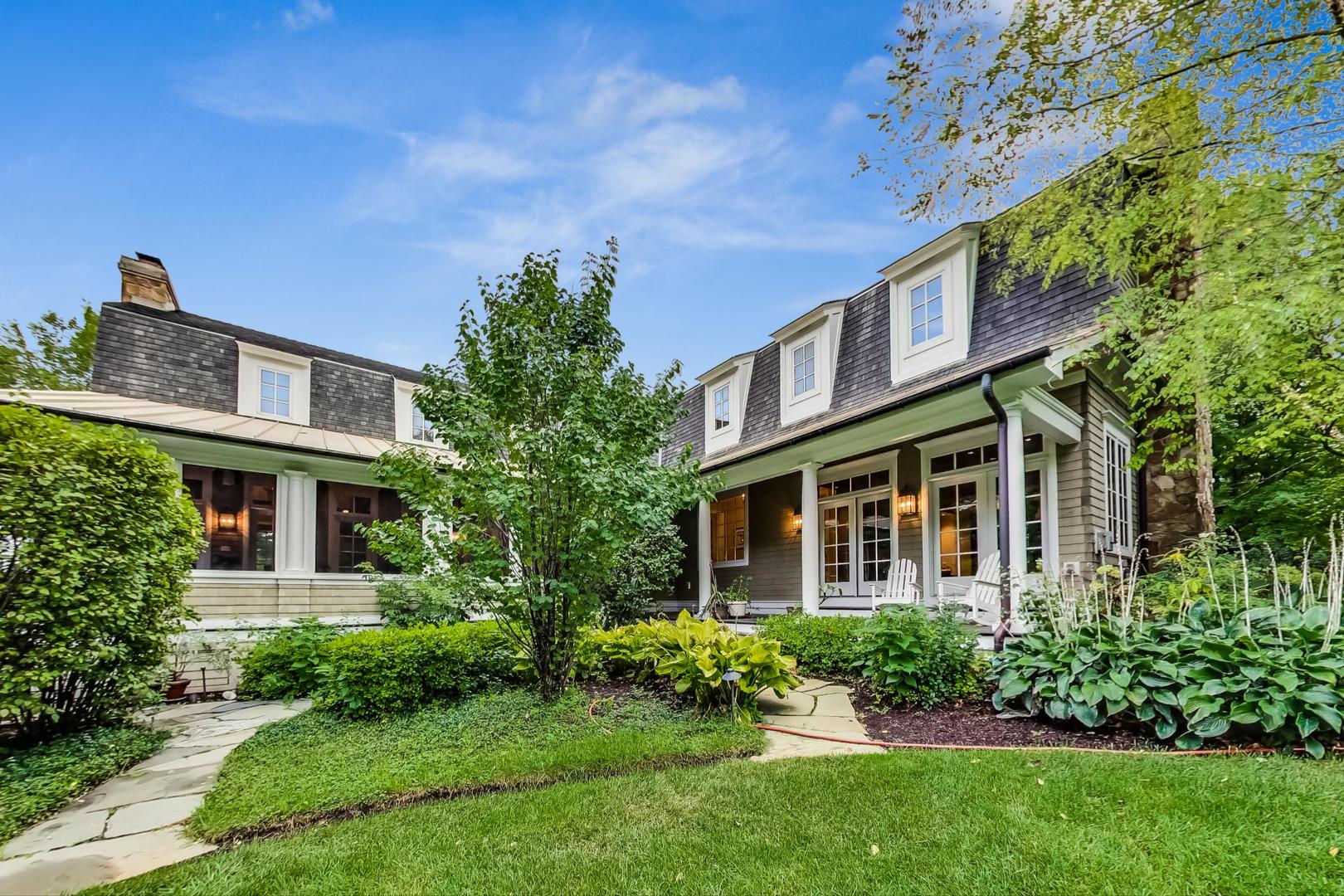 701 Plamondon Road Wheaton, IL 60189 - Photo 74 of 79 a front view of a house with a yard