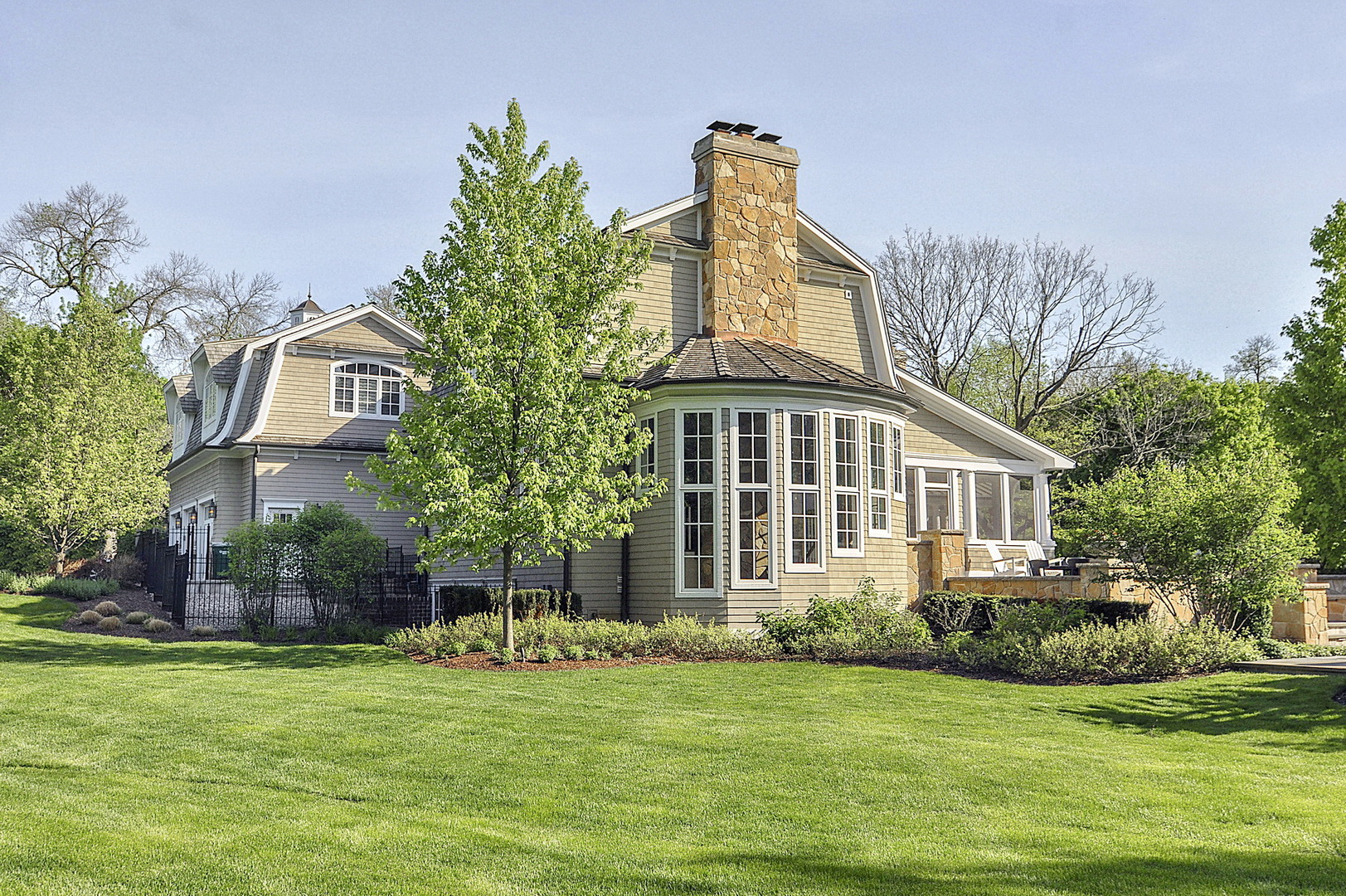 701 Plamondon Road Wheaton, IL 60189 - Photo 75 of 79 a front view of a house with a garden
