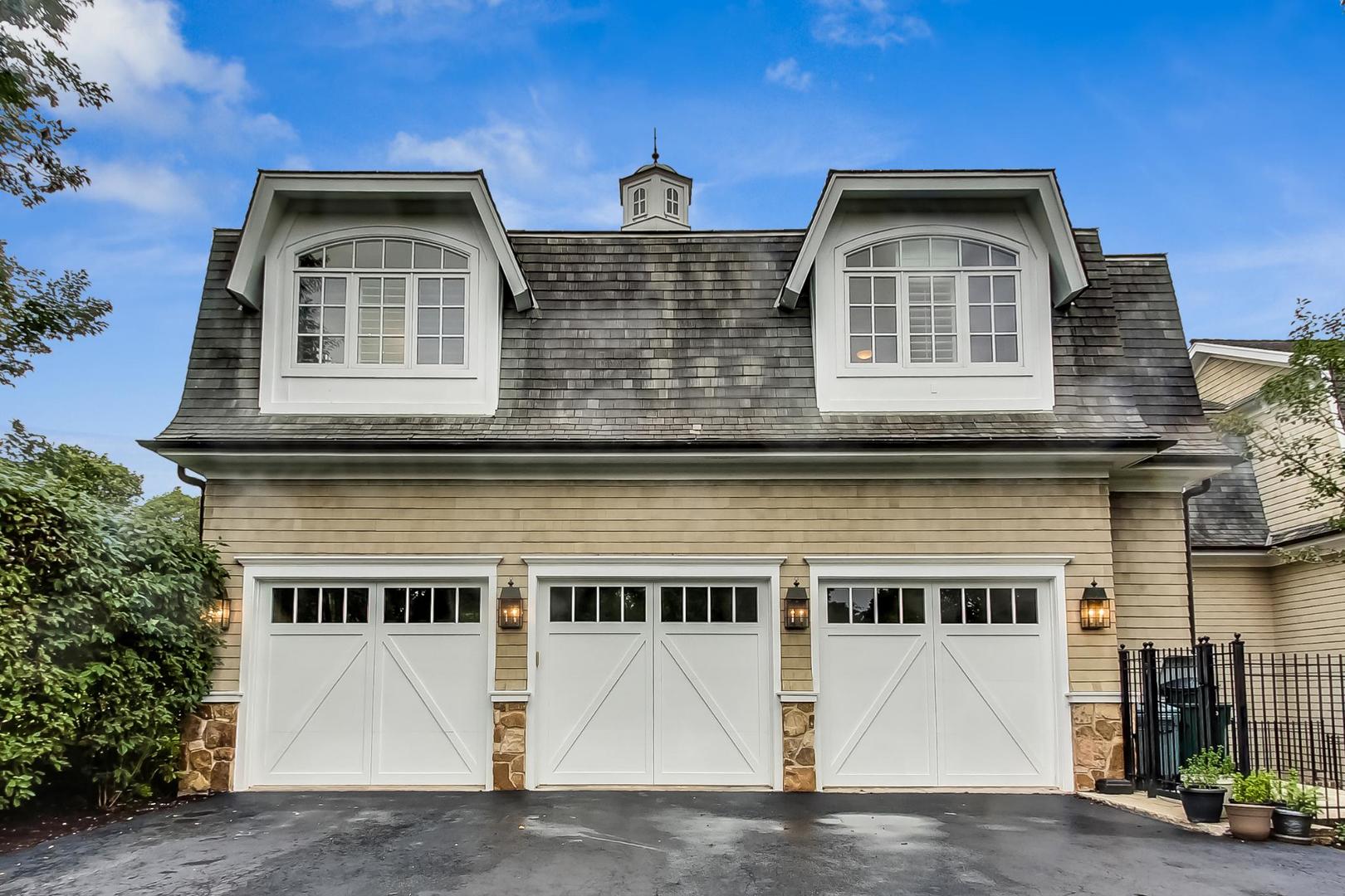 701 Plamondon Road Wheaton, IL 60189 - Photo 76 of 79 a front view of a house with a yard