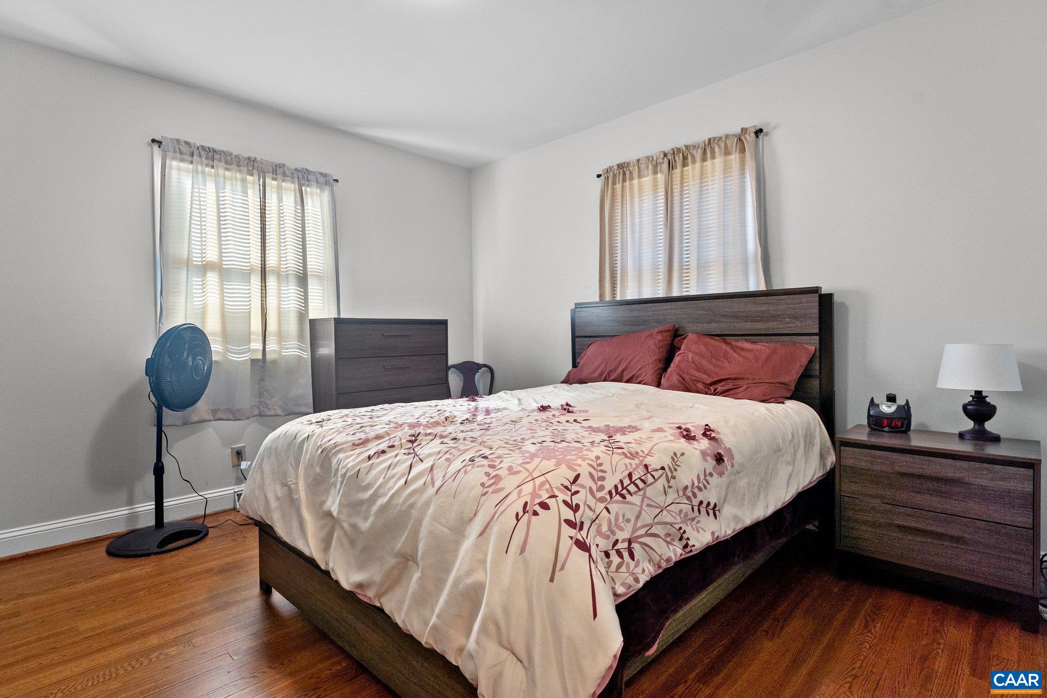 284 Jericho Road Fishersville, VA 22939 - Photo 16 of 30 a bedroom with bed and wooden floor