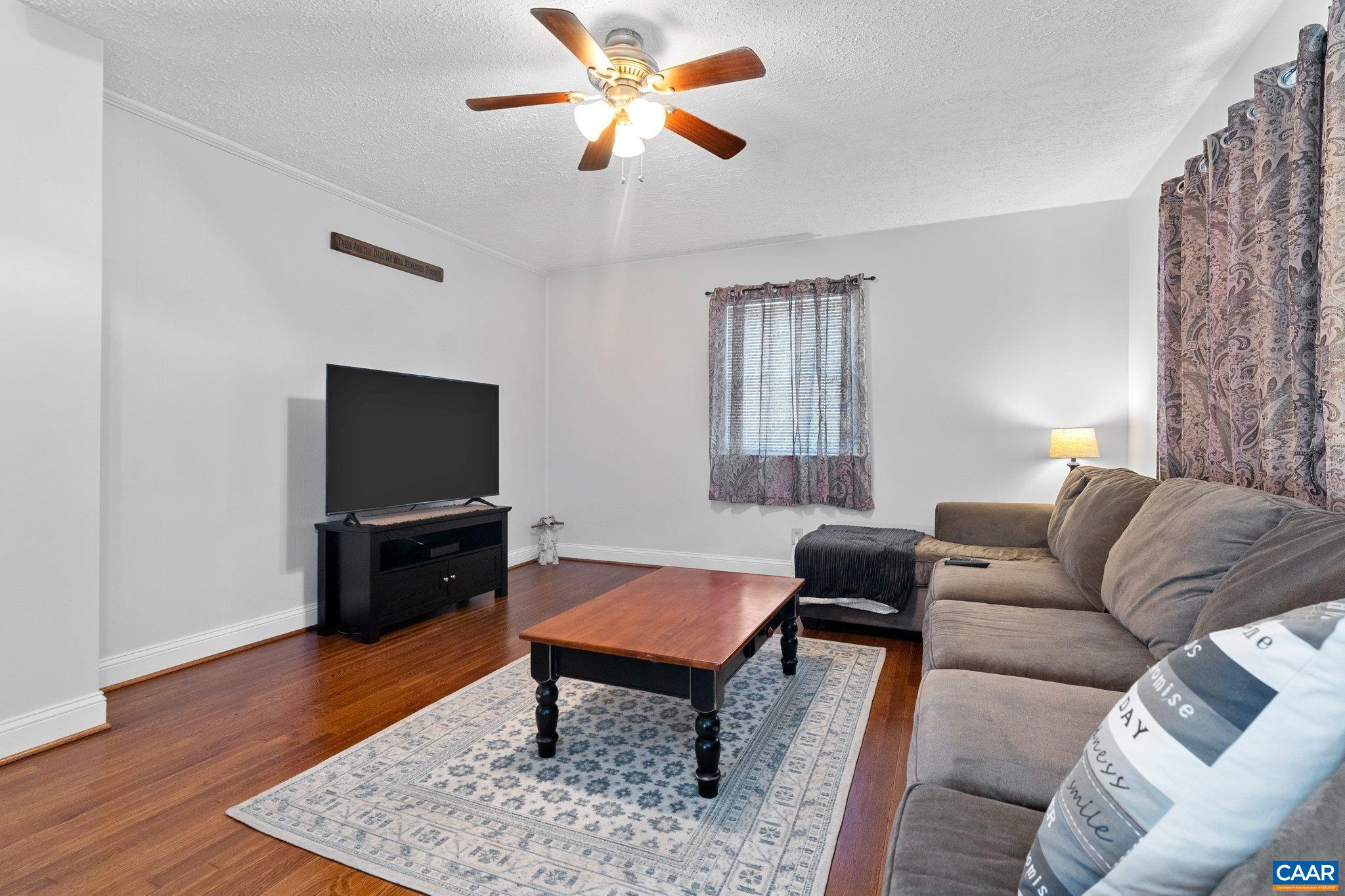 284 Jericho Road Fishersville, VA 22939 - Photo 7 of 30 a living room with furniture and a flat screen tv