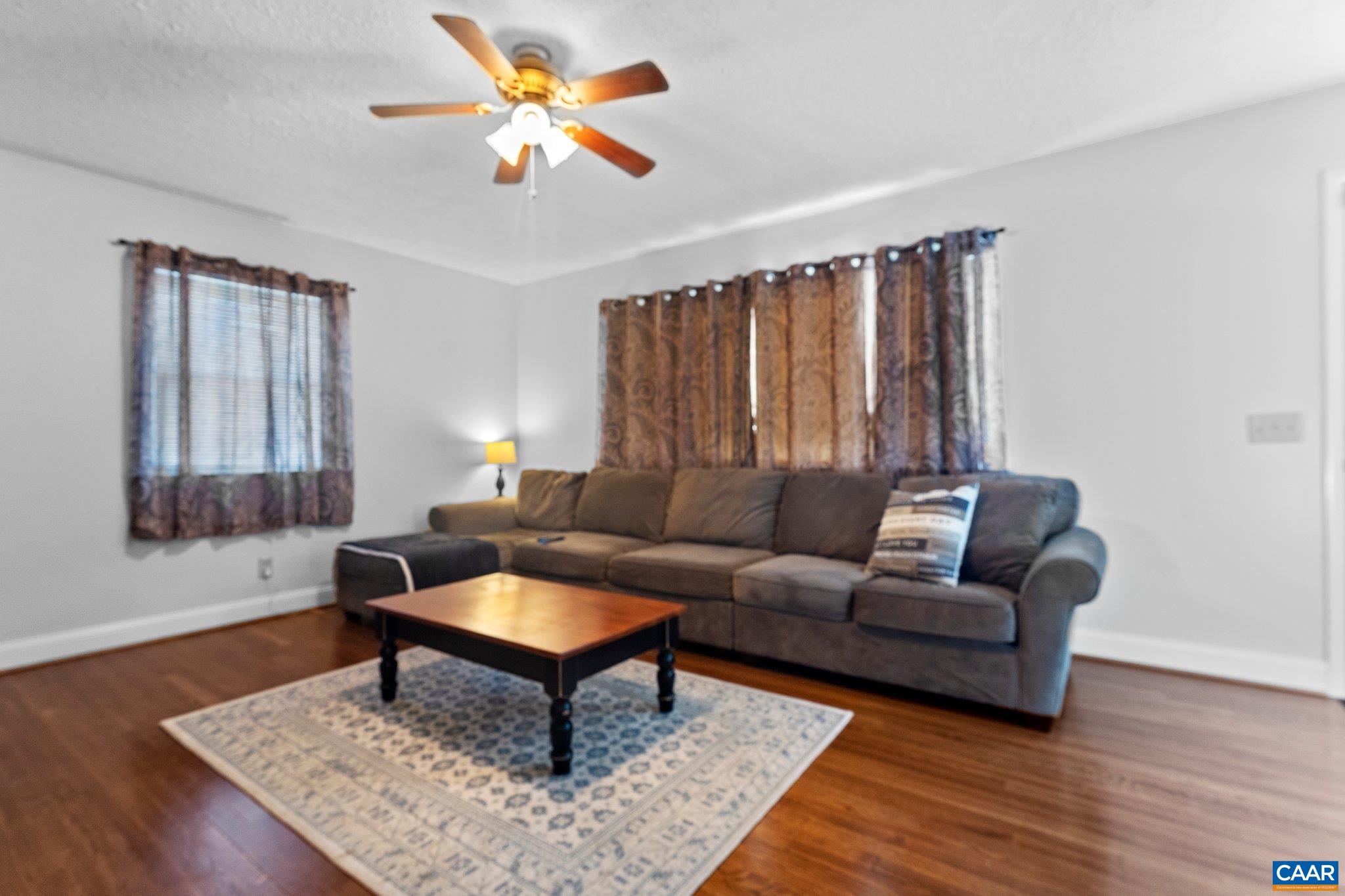 284 Jericho Road Fishersville, VA 22939 - Photo 8 of 30 a living room with furniture a rug and a window