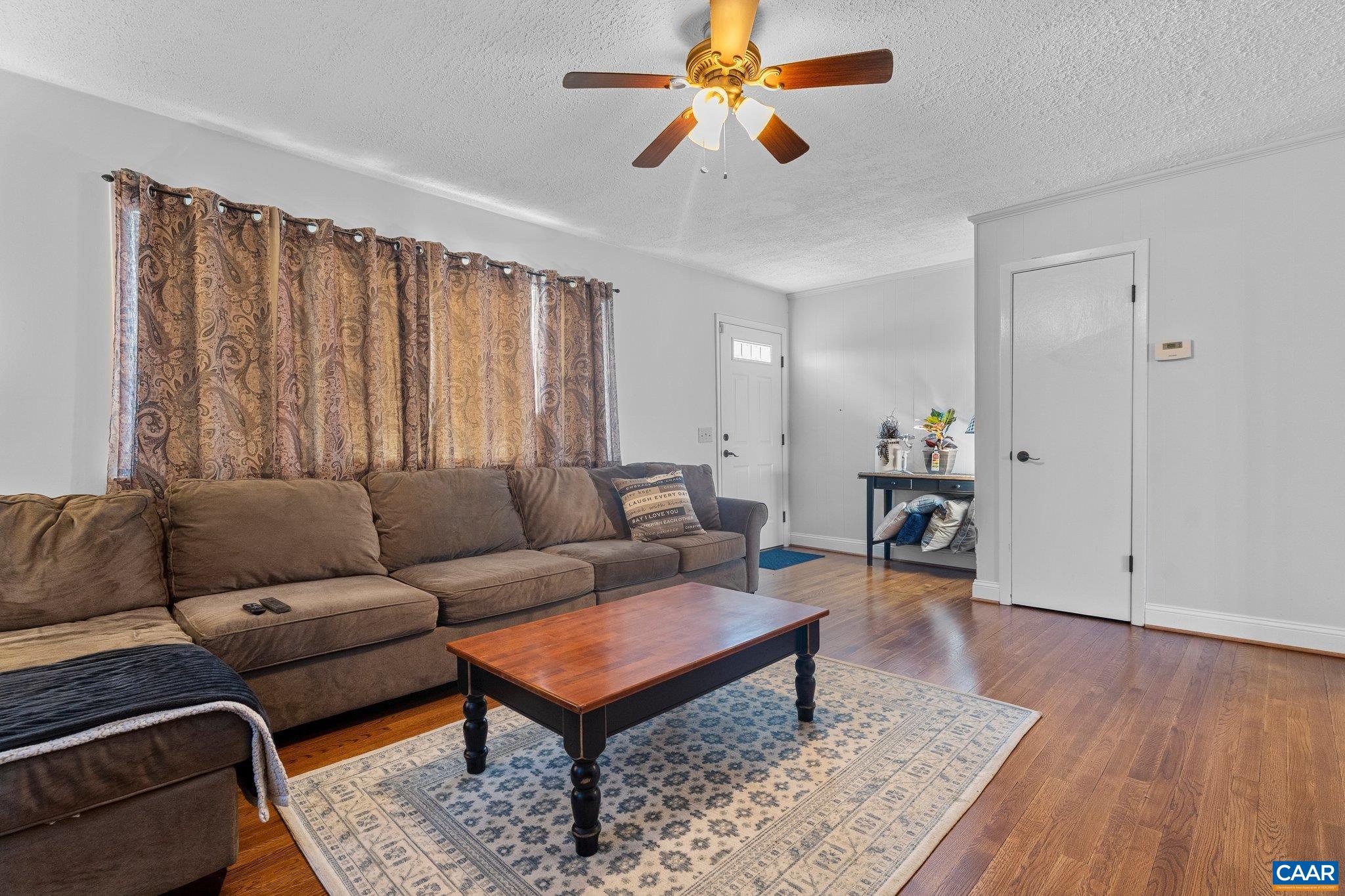 284 Jericho Road Fishersville, VA 22939 - Photo 9 of 30 a living room with furniture and a wooden floor