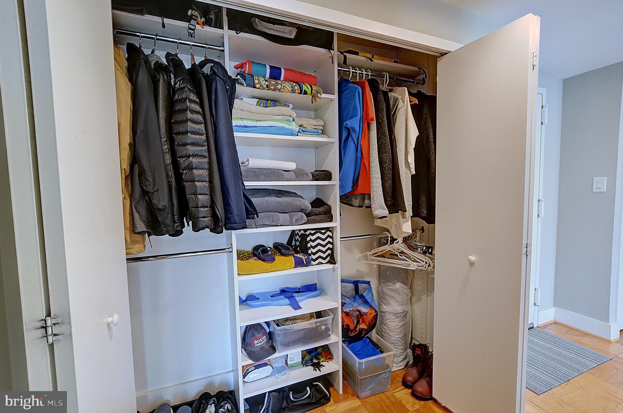 5225 Pooks Hill Road, Unit 121N Bethesda, MD 20814 - Photo 11 of 39 a view of walk in closet with clothes and shoes