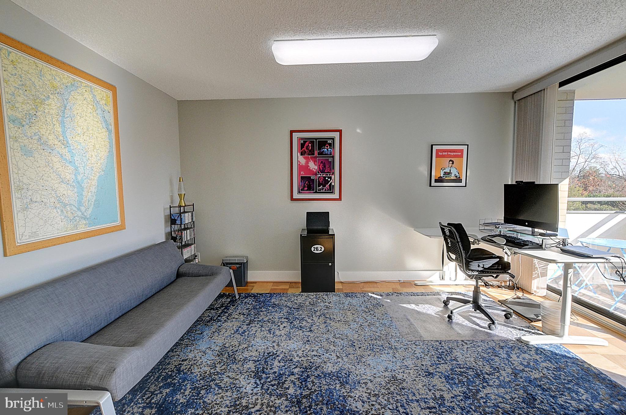 5225 Pooks Hill Road, Unit 121N Bethesda, MD 20814 - Photo 9 of 39 a workspace with furniture and window